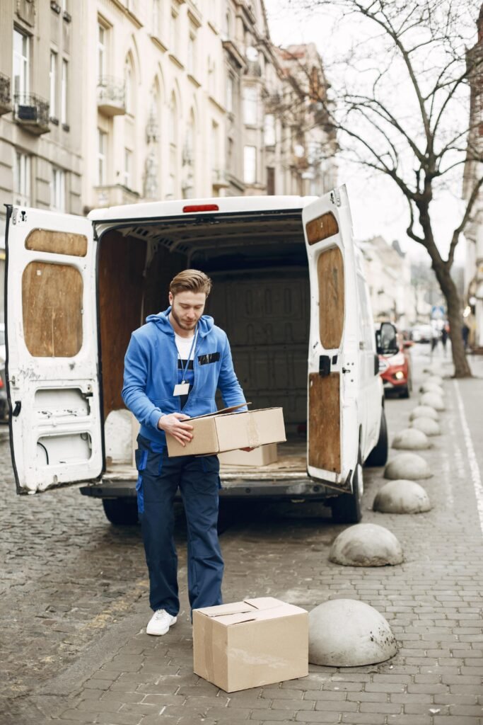man-by-truck-guy-delivery-uniform-min