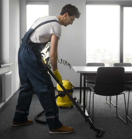 full-shot-man-cleaning-indoors-min